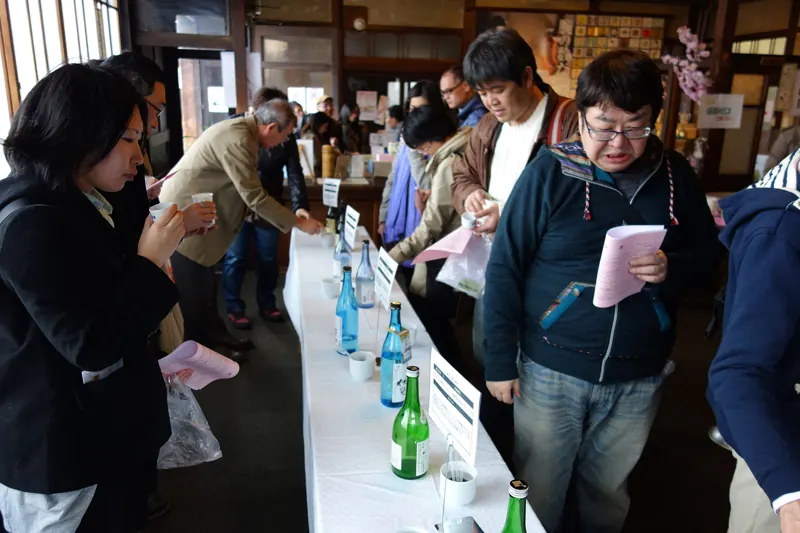 A sake tasting at a new-sake festival in Fushimi, Kyoto